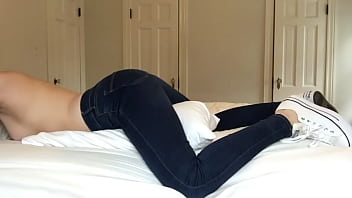 SHE HUMPS A PILLOW WITH TIGHT JEANS ON