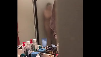 Spy on a hot milf taking a shower